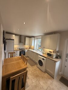Desirable wooden kitchen with integrated Bosch Appliences